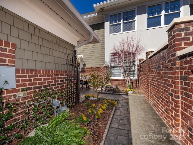 6301 Park Dr S, Charlotte, NC 28210 - view of side of property with brick siding and a patio