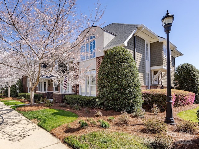 6301 Park Dr S, Charlotte, NC 28210 - view of side of home featuring brick siding and roof with shingles
