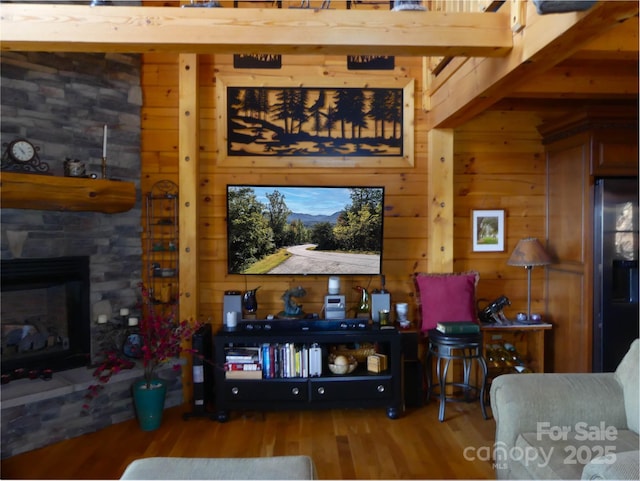 133 Saratoga Dr, Bostic, NC 28018 - living area featuring wood walls, a fireplace, and wood finished floors
