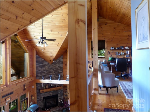 133 Saratoga Dr, Bostic, NC 28018 - living area featuring wooden ceiling, wood finished floors, a ceiling fan, and wood walls