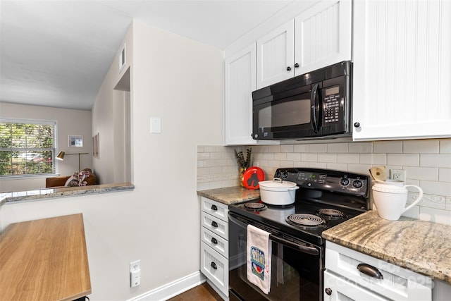 kitchen featuring light stone counters, baseboards, decorative backsplash, black appliances, and white cabinets