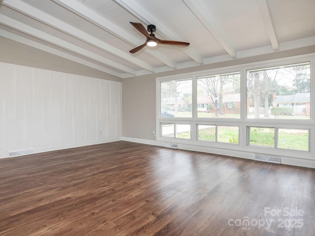 unfurnished room with dark wood-style floors, vaulted ceiling with beams, visible vents, and a ceiling fan
