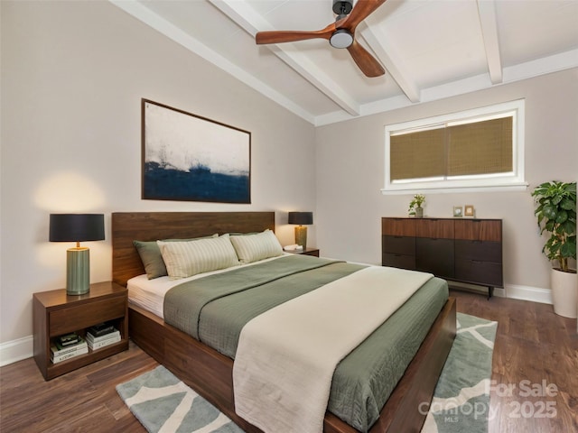 bedroom with vaulted ceiling with beams, wood finished floors, and baseboards