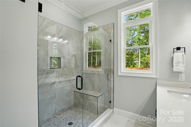 409 Henry Chapel Rd, Belmont, NC 28012 - full bath with a marble finish shower, crown molding, plenty of natural light, vanity, and marble look tile flooring