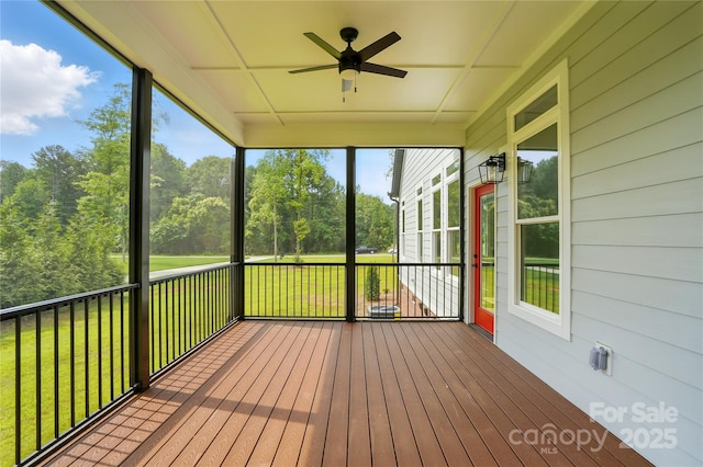 409 Henry Chapel Rd, Belmont, NC 28012 - unfurnished sunroom with ceiling fan, healthy amount of natural light, and view of wooded area