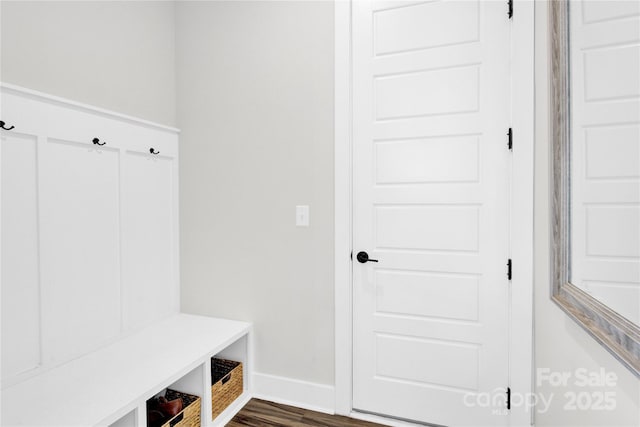mudroom with baseboards and dark wood-style floors