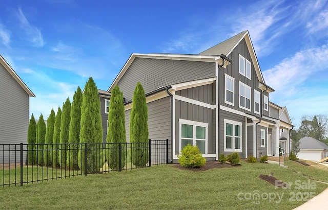 11327 James Coy Rd, Davidson, NC 28036 - view of home's exterior with board and batten siding