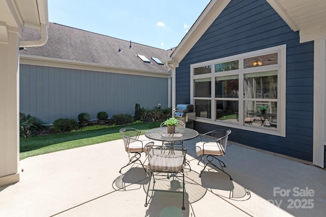 view of patio / terrace with area for grilling and outdoor dining space