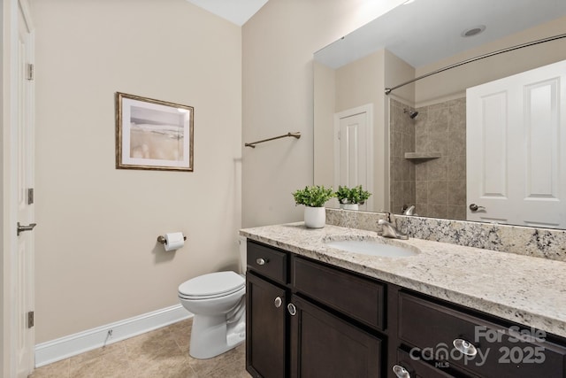 full bathroom featuring a shower, baseboards, toilet, vanity, and tile patterned flooring