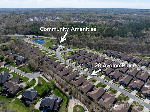 aerial view with a residential view and a forest view