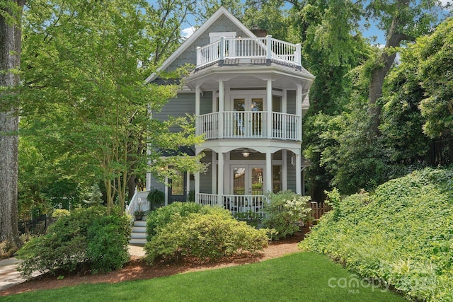 545 Dilworth Mews Ct, Charlotte, NC 28203 - view of front facade featuring a balcony, french doors, a porch, and a chimney