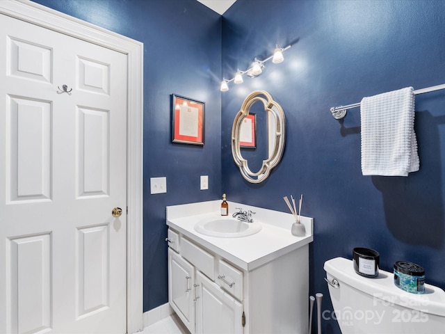 half bath with toilet and vanity