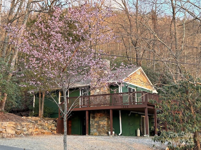 1625 Mountain Cove Rd, Black Mountain, NC 28711 - view of front facade featuring a wooden deck and stone siding