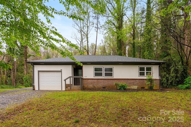 2694 W Lakeshore Dr, Landrum, SC 29356 - single story home featuring brick siding, gravel driveway, an attached garage, stucco siding, and crawl space