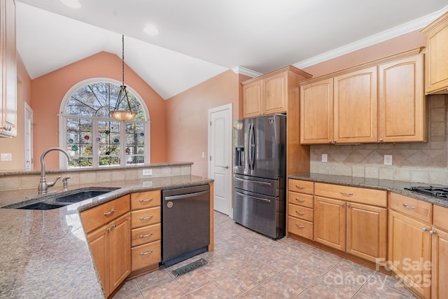 kitchen with a sink, stainless steel fridge with ice dispenser, dishwasher, dark stone countertops, and vaulted ceiling