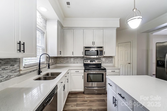 10434 Henbane Ct, Charlotte, NC 28213 - kitchen with visible vents, a sink, stainless steel appliances, white cabinetry, and dark wood-style flooring