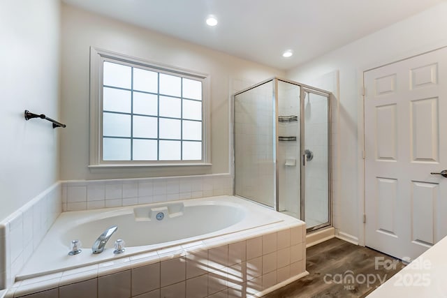 10434 Henbane Ct, Charlotte, NC 28213 - full bath with recessed lighting, a garden tub, wood finished floors, and a shower stall