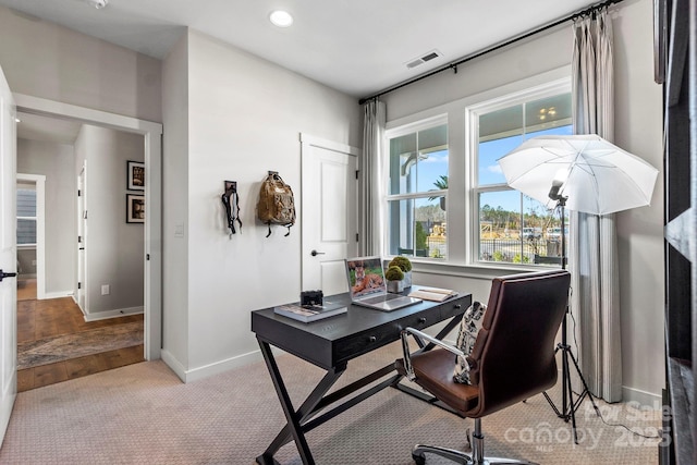 411 Sunharvest Ln, Indian Trail, NC 28079 - home office featuring light carpet, visible vents, recessed lighting, and baseboards