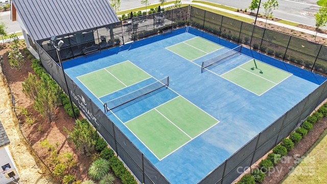 411 Sunharvest Ln, Indian Trail, NC 28079 - view of sport court with a tennis court and fence