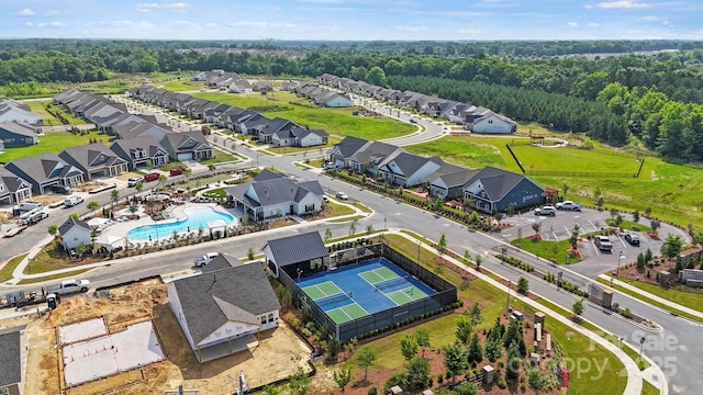 411 Sunharvest Ln, Indian Trail, NC 28079 - birds eye view of property with a forest view and a residential view