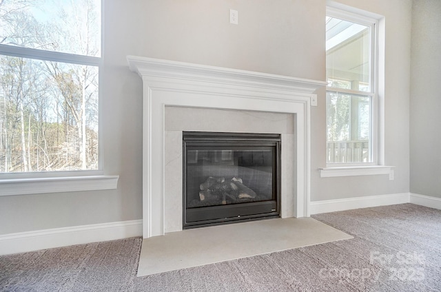 522 Fern Hill Rd Unit 17, Mooresville, NC 28117 - room details with a fireplace with flush hearth, baseboards, and carpet floors