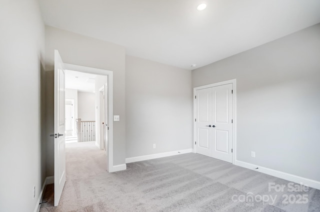 522 Fern Hill Rd Unit 17, Mooresville, NC 28117 - unfurnished bedroom featuring carpet flooring and baseboards