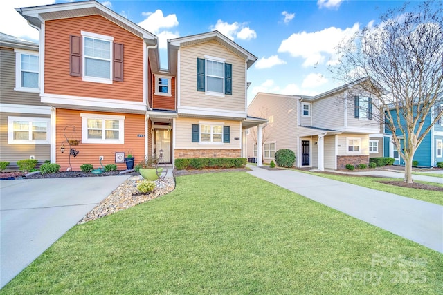 746 Elders Story Rd, Fort Mill, SC 29708 - view of front of house with a front lawn, stone siding, and driveway