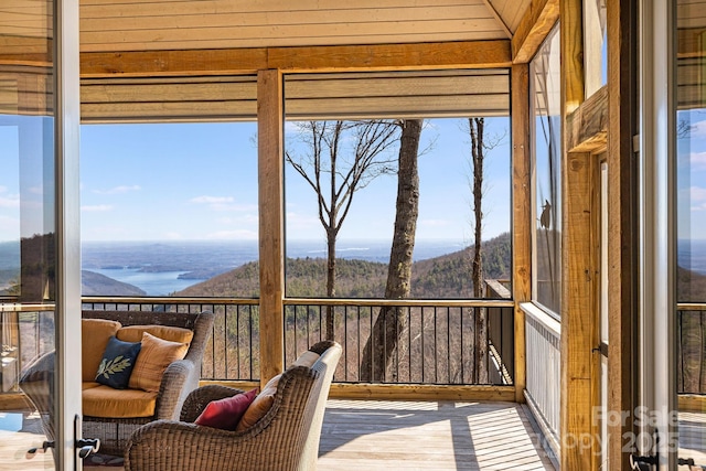 315 Jocassee Trl, Sapphire, NC 28774 - unfurnished sunroom featuring expansive windows and wood finished floors