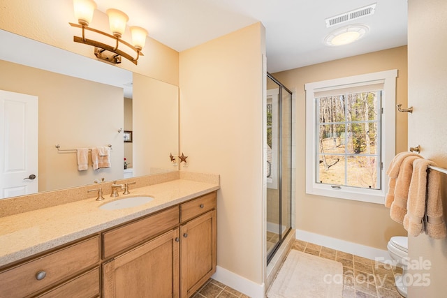 315 Jocassee Trl, Sapphire, NC 28774 - bathroom featuring vanity, baseboards, visible vents, and a stall shower