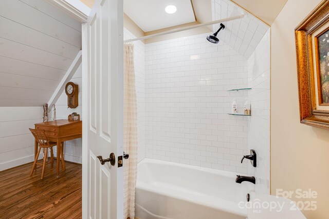 315 Jocassee Trl, Sapphire, NC 28774 - bathroom with lofted ceiling, wood finished floors, and tub / shower combination