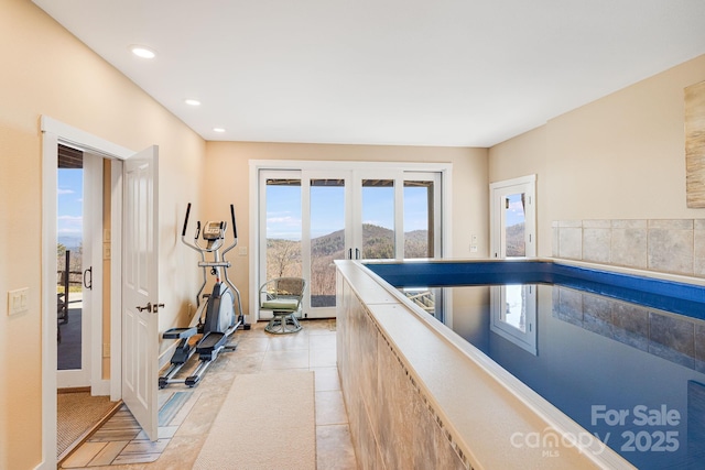 315 Jocassee Trl, Sapphire, NC 28774 - interior space with light tile patterned floors, recessed lighting, and a mountain view