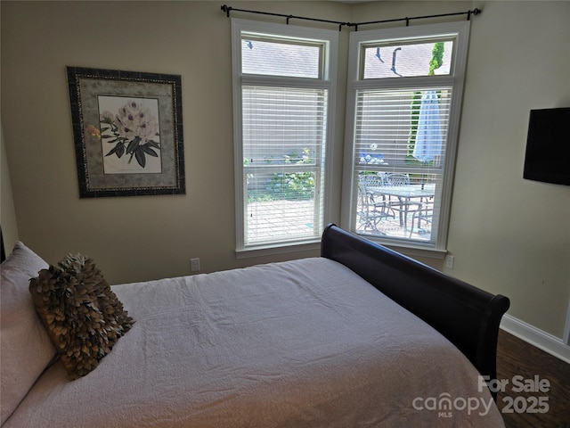 1112 Avalon Pl, Stallings, NC 28104 - bedroom with baseboards and wood finished floors