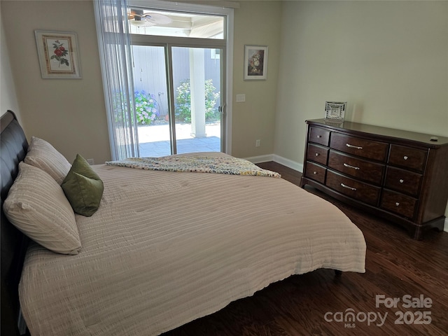 1112 Avalon Pl, Stallings, NC 28104 - bedroom featuring access to exterior, multiple windows, baseboards, and dark wood-style flooring