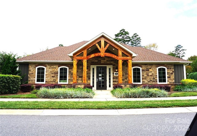 1112 Avalon Pl, Stallings, NC 28104 - single story home with stone siding, a shingled roof, and covered porch
