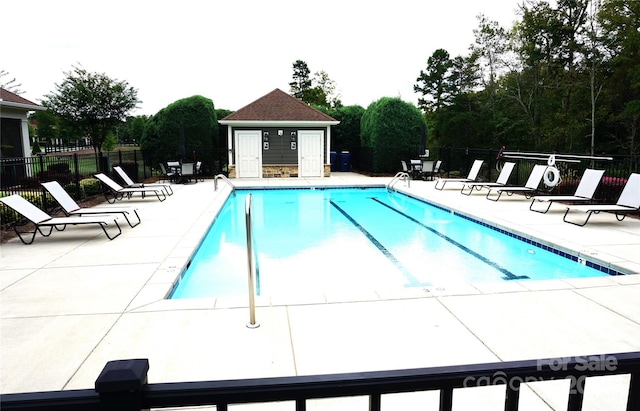 1112 Avalon Pl, Stallings, NC 28104 - community pool with a patio and view of scattered trees
