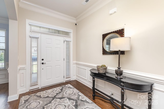 2110 Capricorn Ave, Indian Trail, NC 28079 - foyer entrance with crown molding, dark wood-style flooring, a wainscoted wall, and a decorative wall