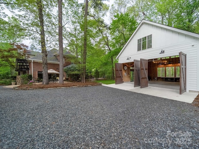 view of front facade with board and batten siding
