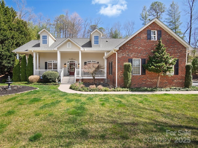 155 Jonathan Creek Dr, Etowah, NC 28729 - cape cod home featuring brick siding, a front lawn, a porch, and roof with shingles
