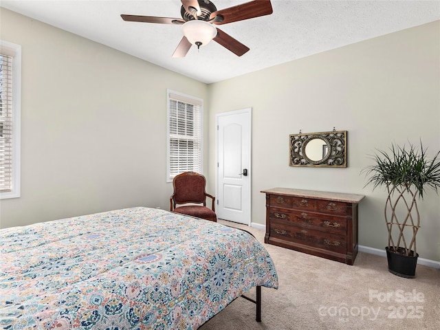 155 Jonathan Creek Dr, Etowah, NC 28729 - carpeted bedroom with baseboards and a ceiling fan