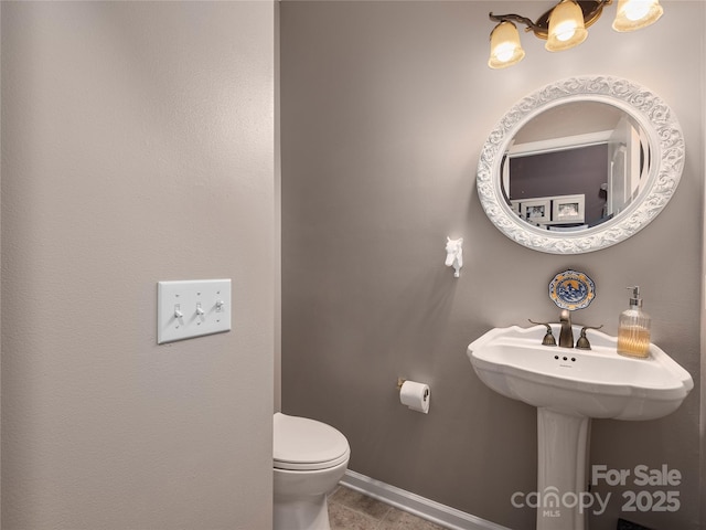 155 Jonathan Creek Dr, Etowah, NC 28729 - bathroom with tile patterned flooring, baseboards, and toilet