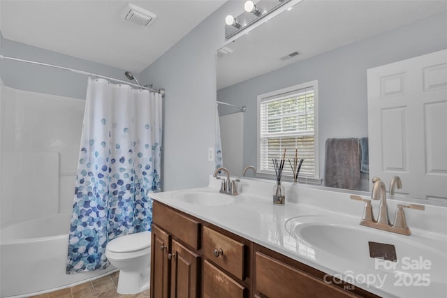 1017 Chalk Hill Ln, Charlotte, NC 28214 - full bath featuring double vanity, shower / tub combo, toilet, and tile patterned flooring