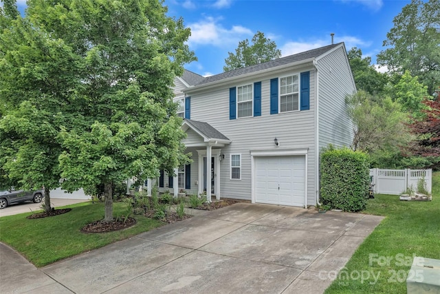 1017 Chalk Hill Ln, Charlotte, NC 28214 - view of front facade with an attached garage, driveway, and covered porch