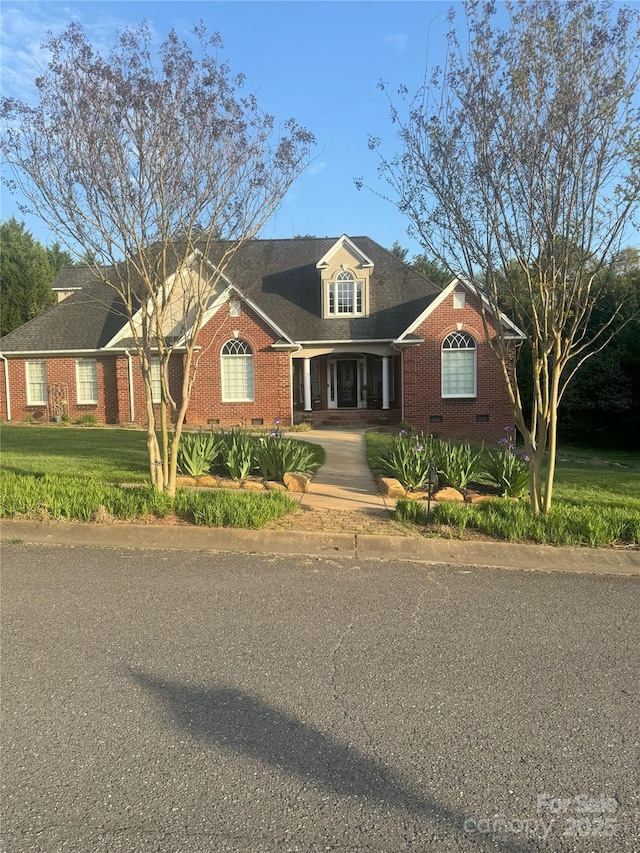 1308 Moonshadow Ln, Shelby, NC 28150 - view of front of property featuring a front yard, brick siding, and crawl space