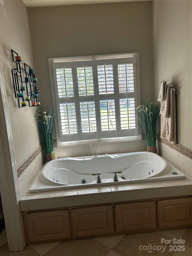1308 Moonshadow Ln, Shelby, NC 28150 - bathroom featuring a jetted tub and tile patterned flooring