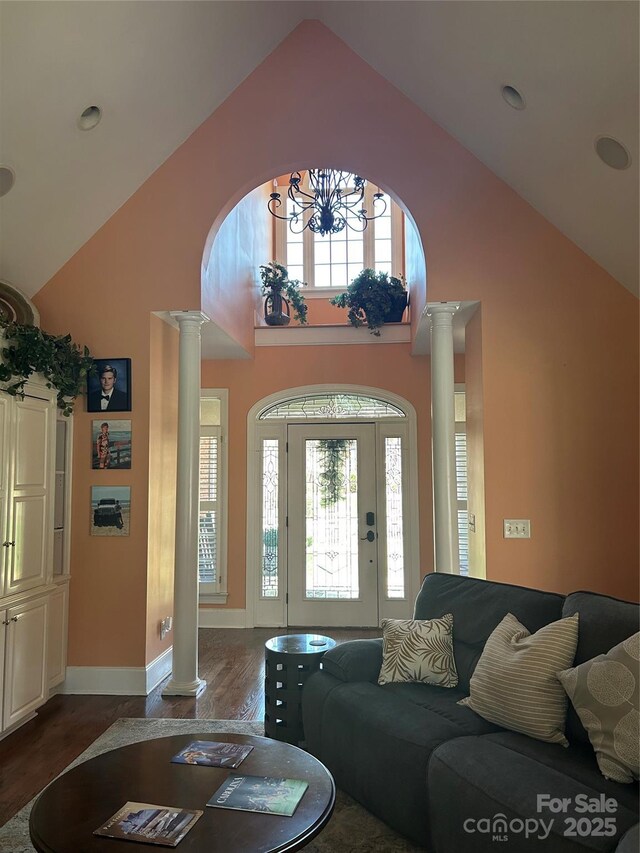 1308 Moonshadow Ln, Shelby, NC 28150 - living room with decorative columns, dark wood-style floors, a wealth of natural light, and high vaulted ceiling