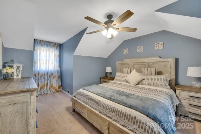 bedroom featuring baseboards, ceiling fan, vaulted ceiling, and carpet