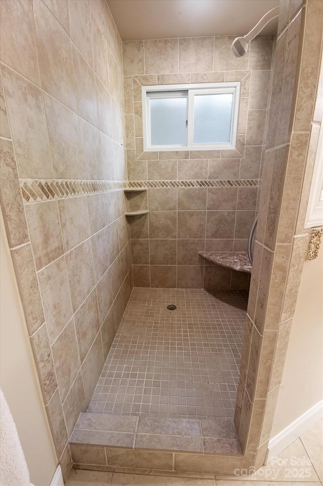 1506 Lynn Rd, Columbus, NC 28722 - full bath featuring tiled shower and tile patterned floors