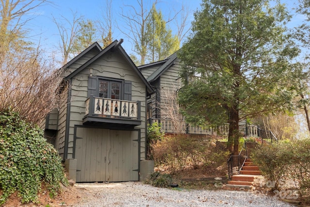 1506 Lynn Rd, Columbus, NC 28722 - tudor home with a balcony and stairway
