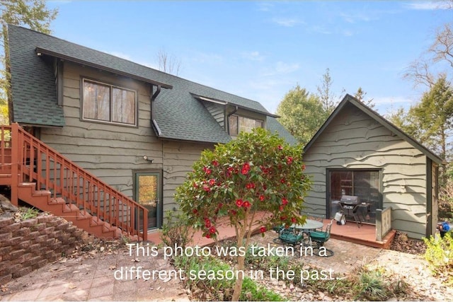 1506 Lynn Rd, Columbus, NC 28722 - rear view of house with a wooden deck, a shingled roof, and stairway