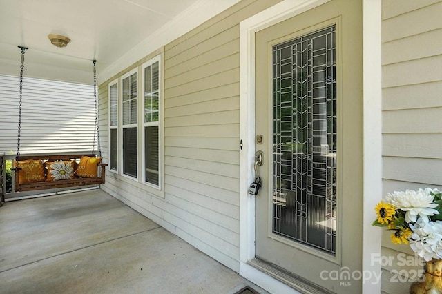 5807 Mctaggart Ln, Charlotte, NC 28269 - entrance to property featuring a porch